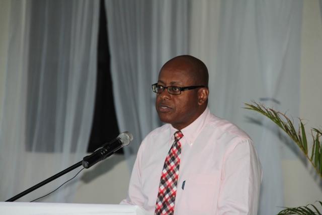 Permanent Secretary in the Ministry of Finance in the Nevis Island Administration Laurie Lawrence delivering remarks at the Nevis Financial Services Regulation and Supervision Department’s 2014 AML/CFT Seminar and Training workshop at the Occasions Entertainment Arcade on March 03, 2014.